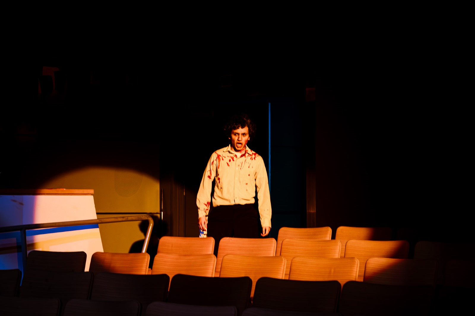 Joshua Soto in a stage performance of Sweeney Todd