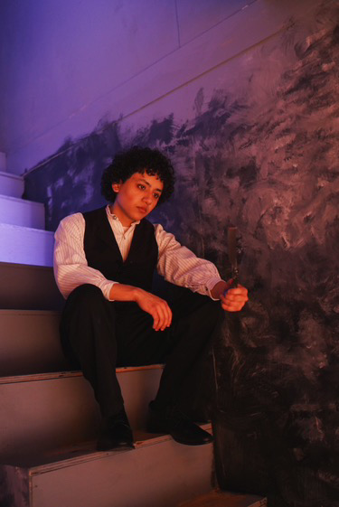 Joshua Soto on stage in costume as Sweeney Todd